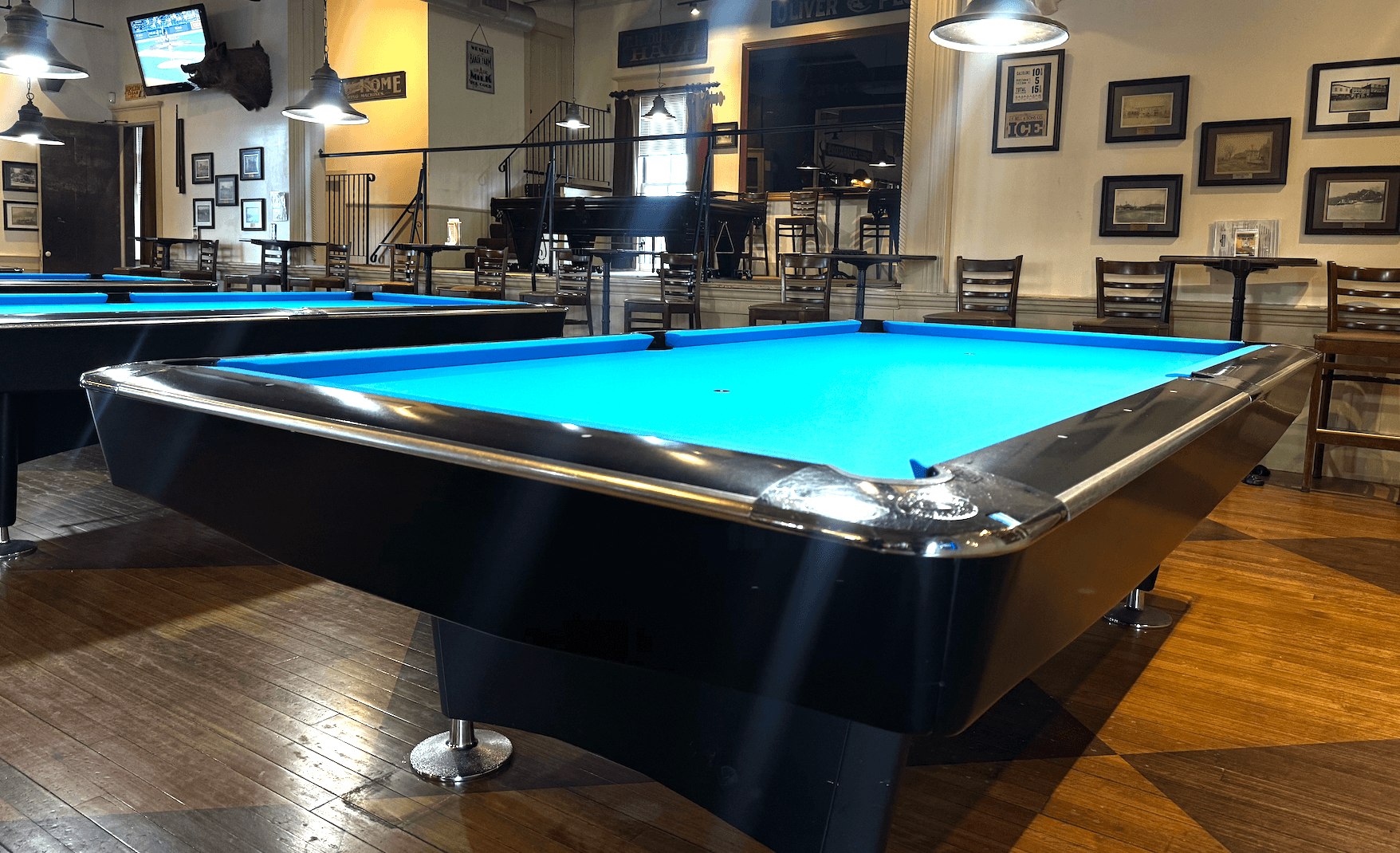 Brunswick Gold Crown table recovered in Tournament Blue at The Billiards Café