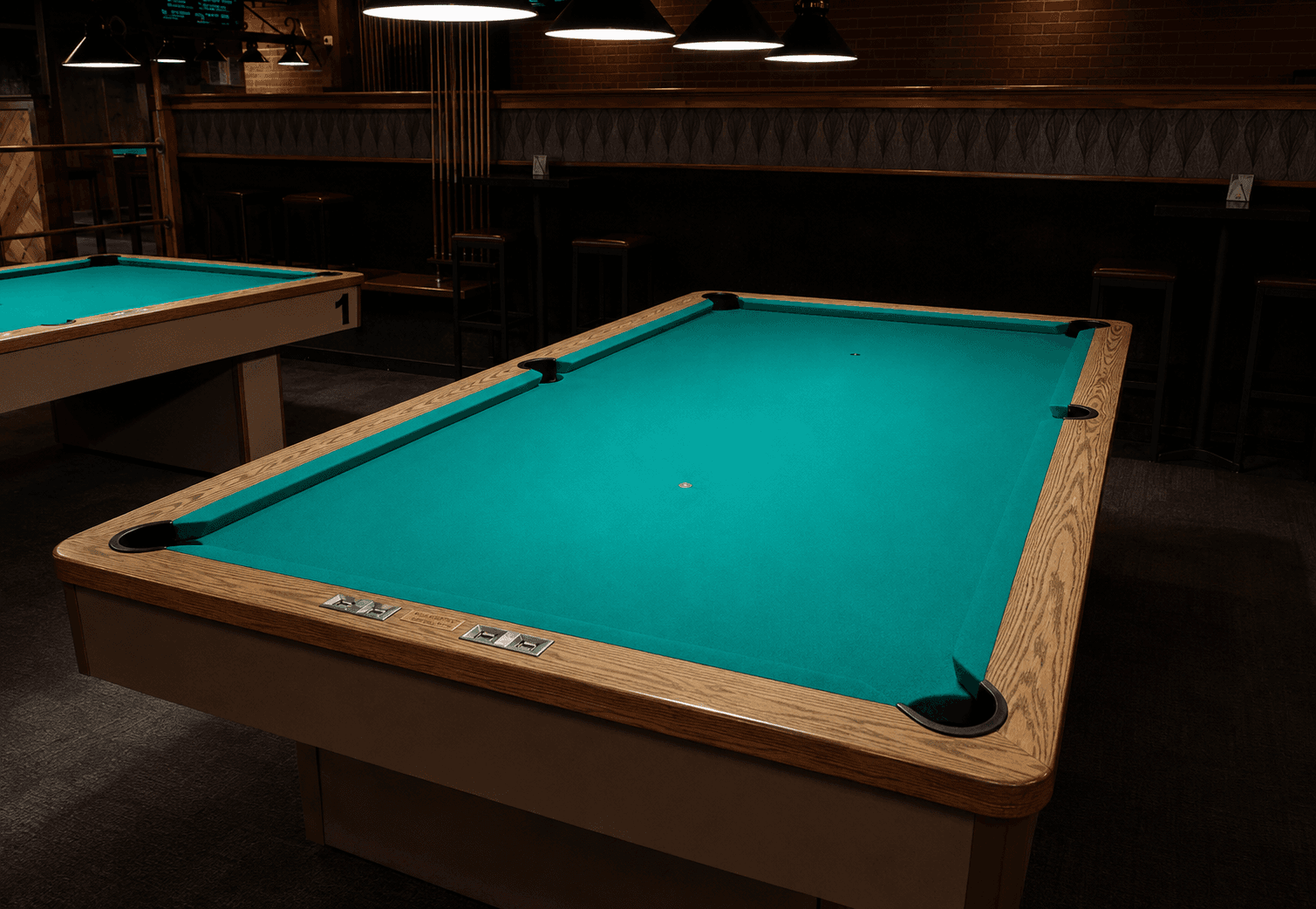 Freshly recovered table with oak rails at Legends
