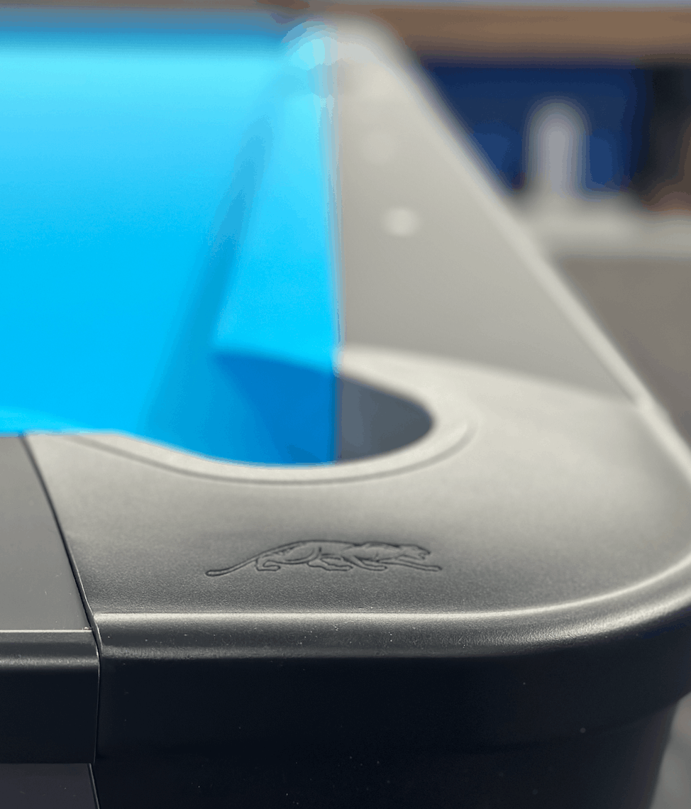 Close-up of a pocket with the panther logo on the rail cap
