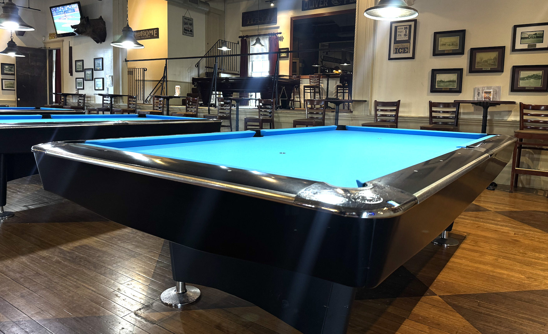 Brunswick Gold Crown table recovered in Tournament Blue at The Billiards Café