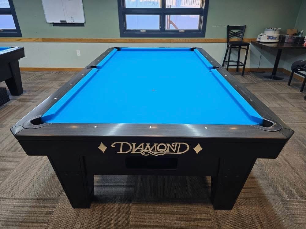 Close-up of a Diamond table with new blue cloth at East Side Club